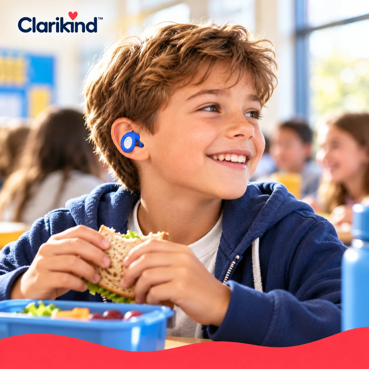 Child using small blue Clarikind reusable earplugs during lunch at school