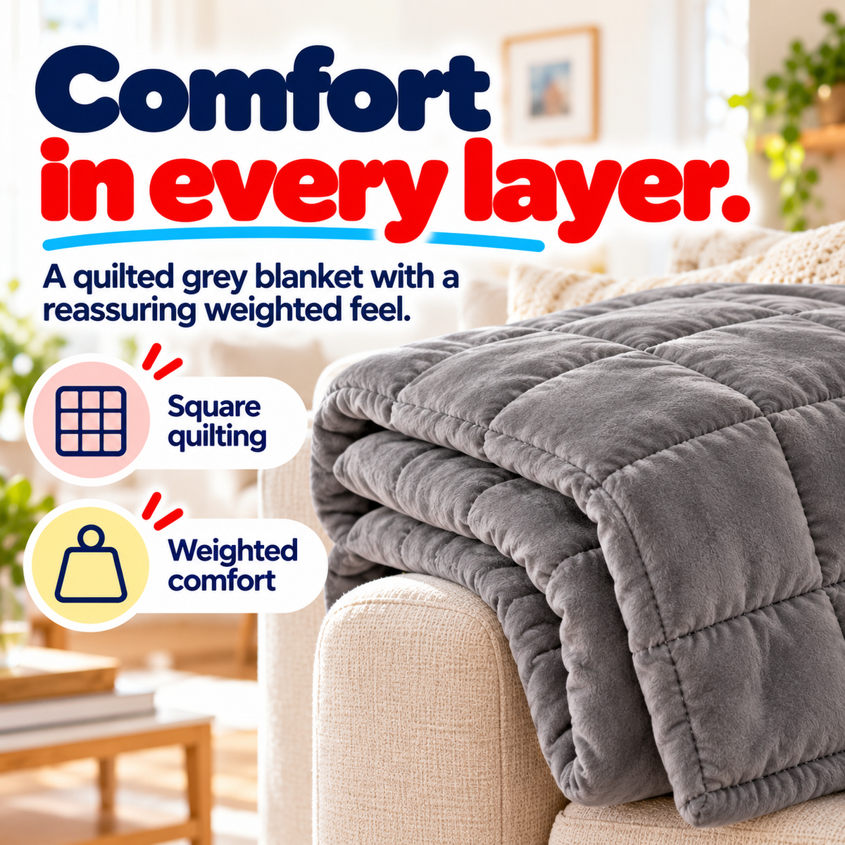 Grey square-quilted weighted blanket folded on a sofa