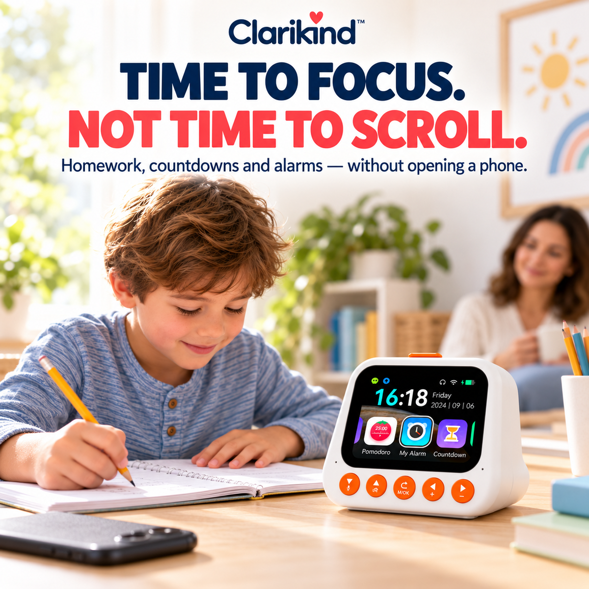 Child doing homework beside the Clarikind smart alarm clock for kids while a smartphone stays face-down