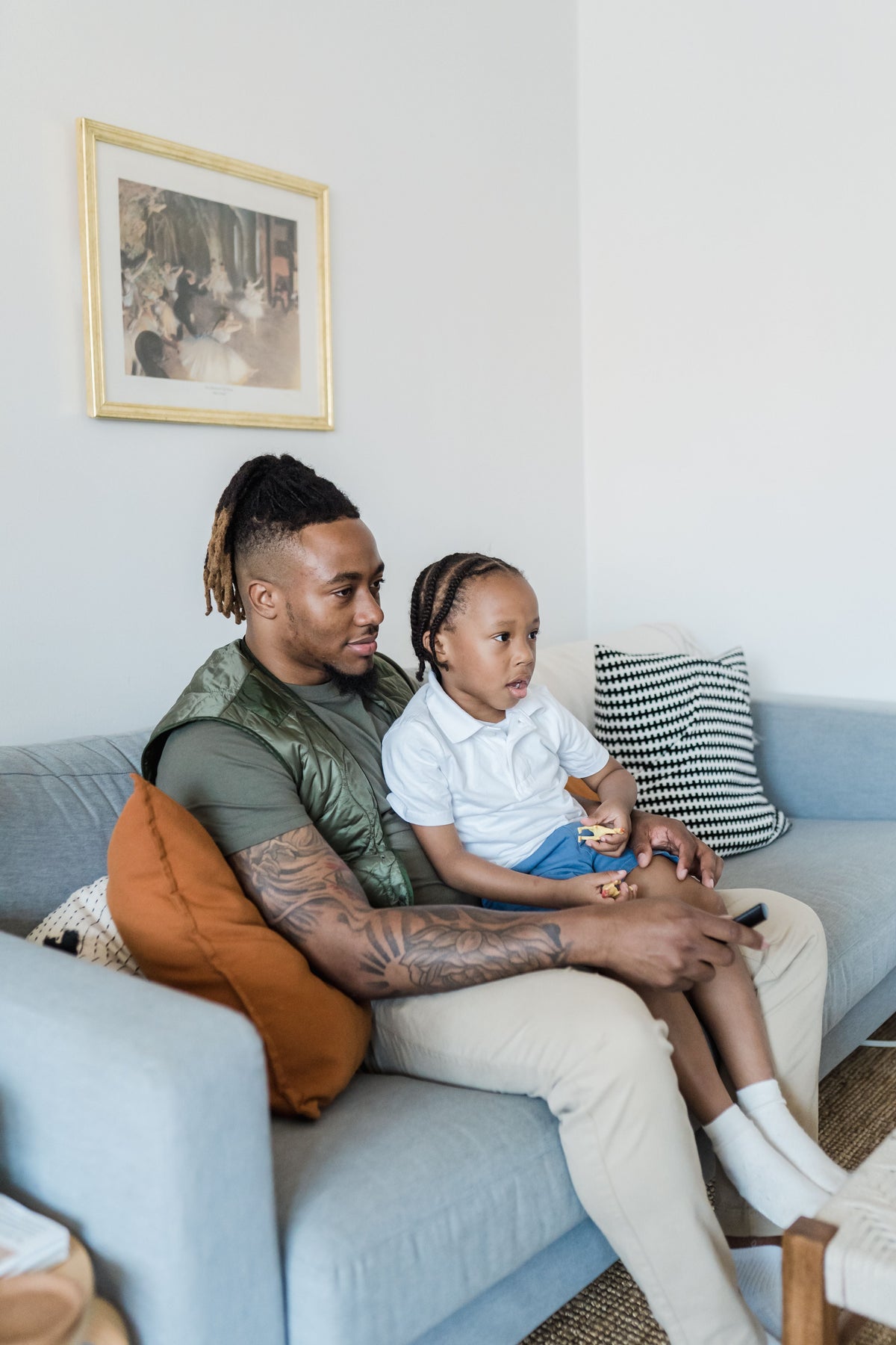 Parent and child sharing a calm break together at home