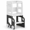 Foldable learning tower kitchen helper in white and grey with safety rails, on a white background