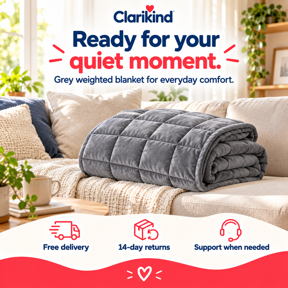 Grey weighted blanket folded on a sofa with Clarikind free delivery and 14-day returns information