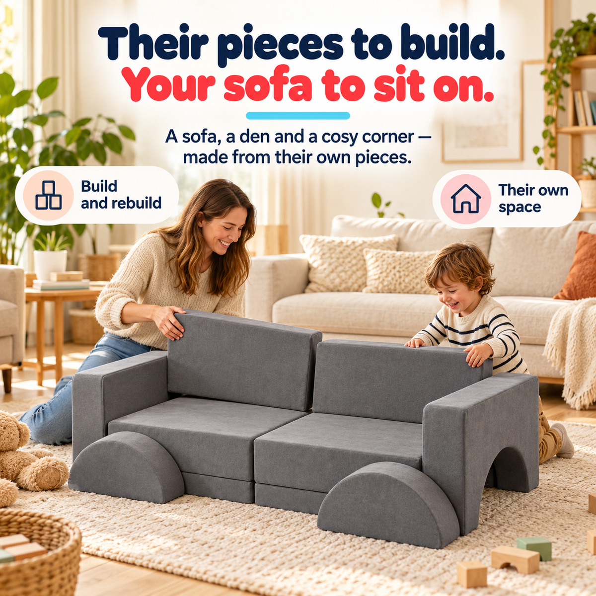 Parent and child arranging grey modular sofa pieces for play