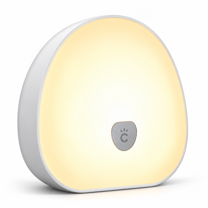 White noise machine for kids with warm white night light, shown alone on a white background